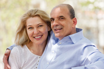 A man and his wife sit together outside. Links to Gifts That Pay You Income A man and his wife sit together outside. Links to Gifts That Pay You Income